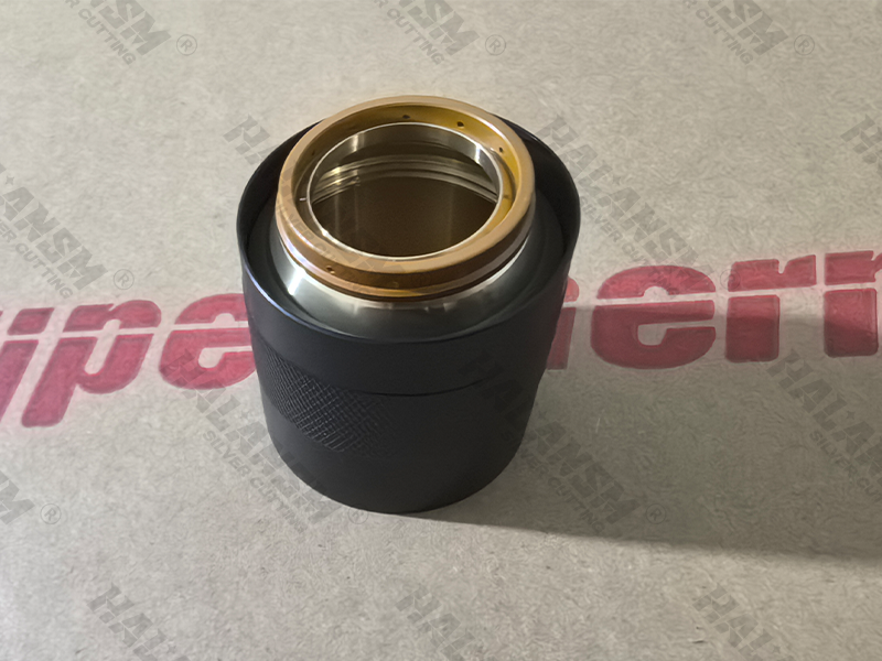 High-resolution angled view of the HALANSM 220757 inner shield with gold-plated retaining ring, designed for Hypertherm HPR260XD 200A mild steel cutting applications.