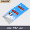 Two HALANSM lens cleaning paper booklets, size 10x15cm, lint-free optical wiper