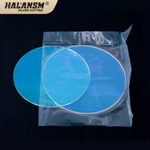 HALANSM Large Lens Series field lens held by gloved hand, Chisai Laser, double-sided coating