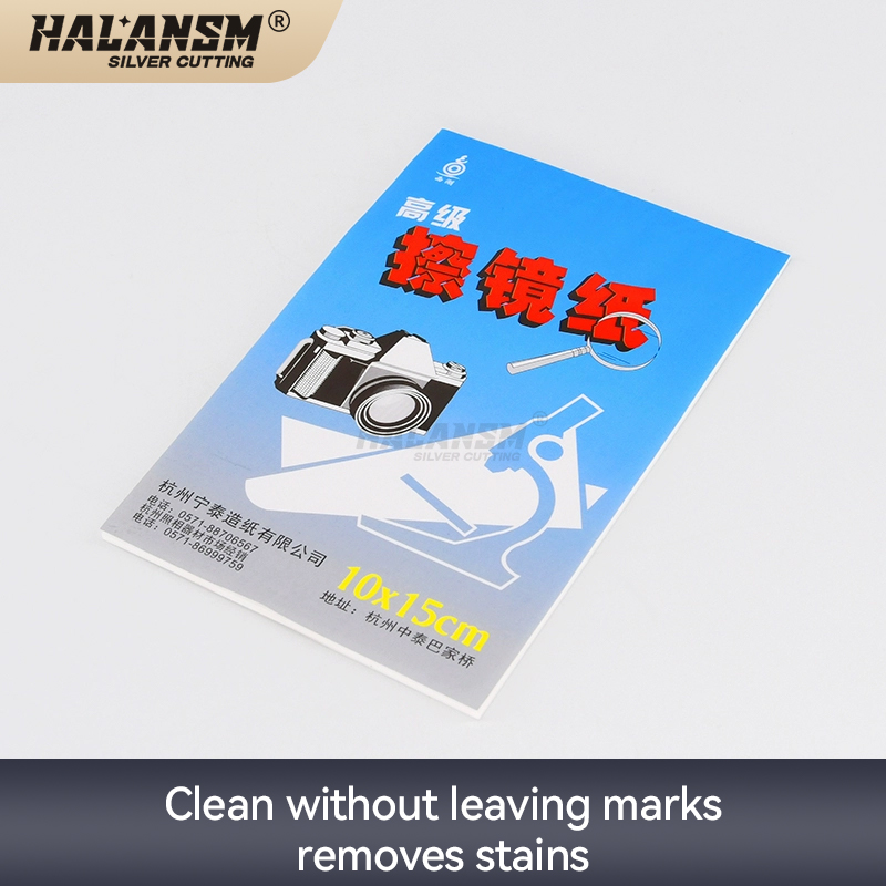 Single HALANSM lint-free lens cleaning sheet unfolded, soft white tissue paper